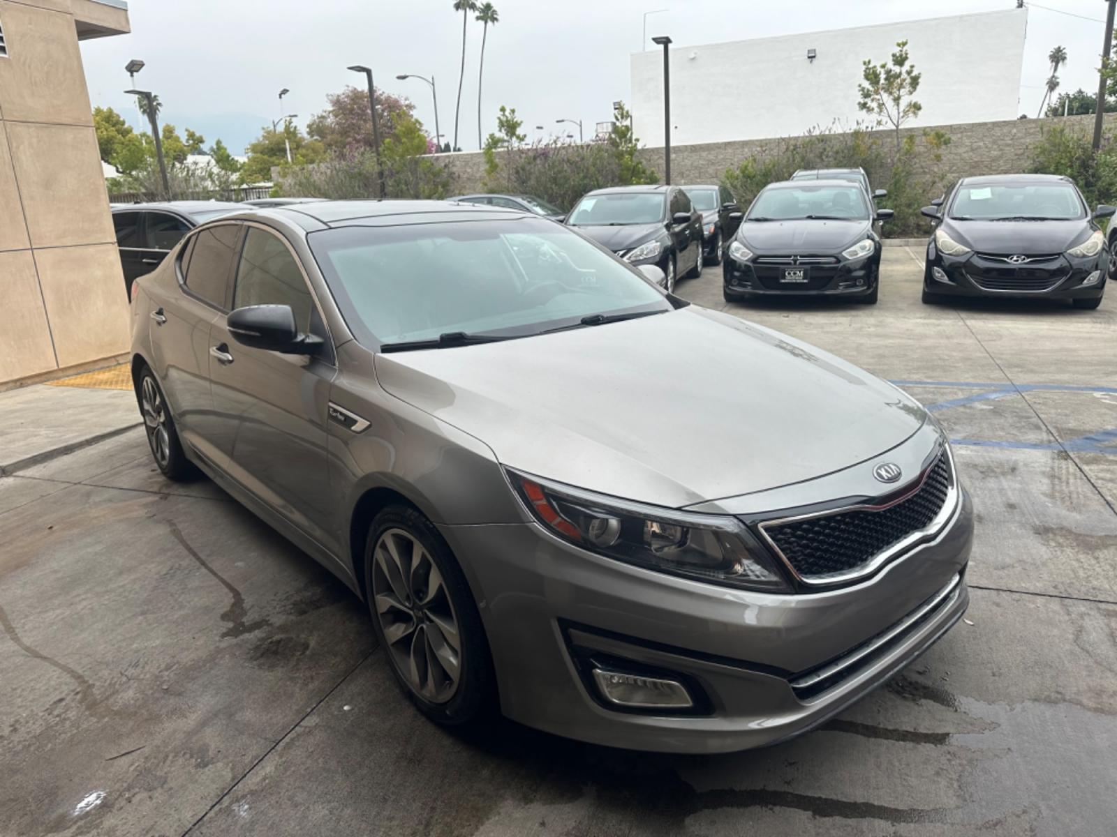 2014 Gray /BLACK Kia Optima SX Turbo (5XXGR4A62EG) with an 2.0L L4 DOHC 16V TURBO engine, 6-Speed Automatic transmission, located at 30 S. Berkeley Avenue, Pasadena, CA, 91107, (626) 248-7567, 34.145447, -118.109398 - New tires! Moon Roof! Nice Interior! Looks and drives good! Bad credit? We can help! We are the bank. All our cars are thoroughly inspected and reconditioned by our technicians. FREE CARFAX report. Stop by or call to speak with our friendly staff. Whether you have bad credit, no credit, bankruptcy, - Photo #6